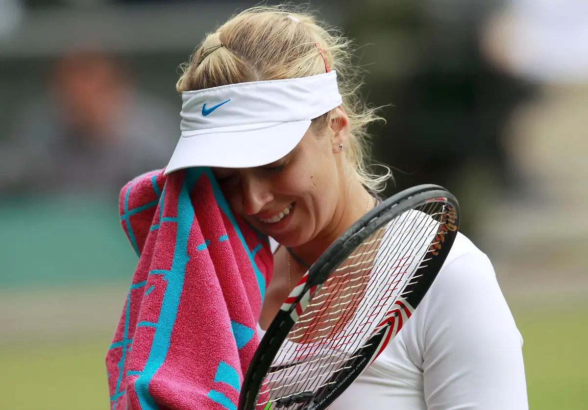 2011-06-30T161124Z-01-WIM147-RTRMDNP-3-TENNIS-WIMBLEDON-JPG1012933562430850020