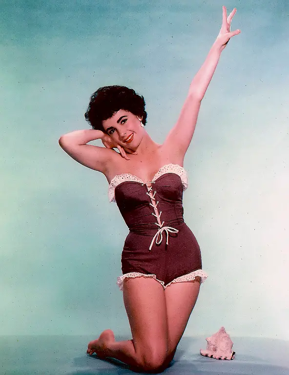 2011-03-23T132525Z-01-WAS04-RTRMDNP-3-PEOPLE-TAYLOR-JPG3492994750752051544