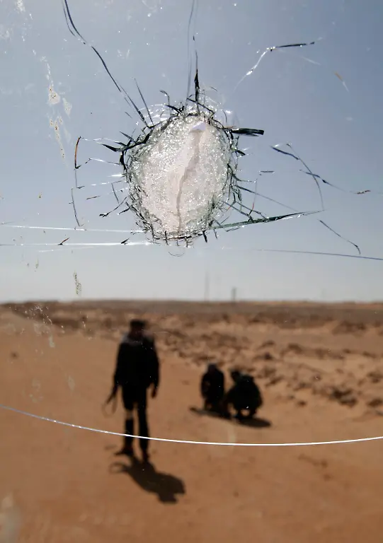 2011-03-11T130825Z-01-ASM104-RTRMDNP-3-LIBYA-JPG4768052264273424299