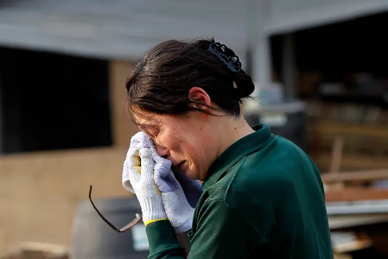 2011-03-14T113725Z-01-SHA110-RTRMDNP-3-JAPAN-QUAKE-JPG7537006454136957416