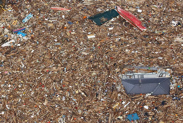 2011-03-14T090908Z-01-SIN502-RTRMDNP-3-JAPAN-QUAKE-JPG7673044776624412970