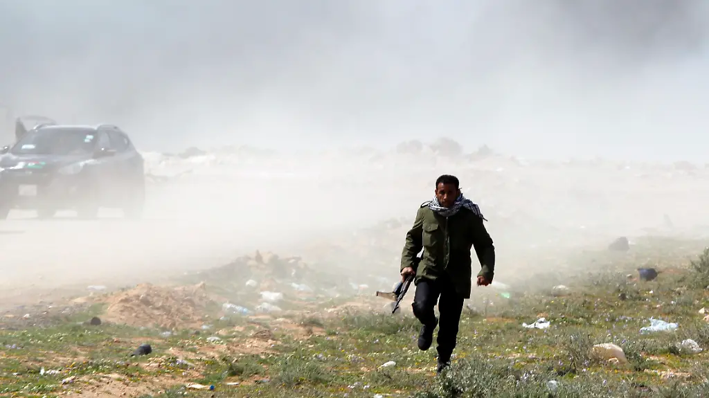 2011-03-12T132004Z-01-GOT05-RTRMDNP-3-LIBYA-JPG4828828913270754557