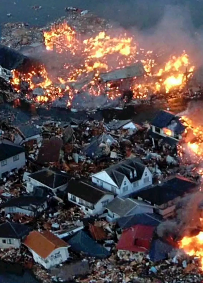 2011-03-11T112648Z-01-SIN012-RTRMDNP-3-JAPAN-QUAKE-JPG5330733391528269771