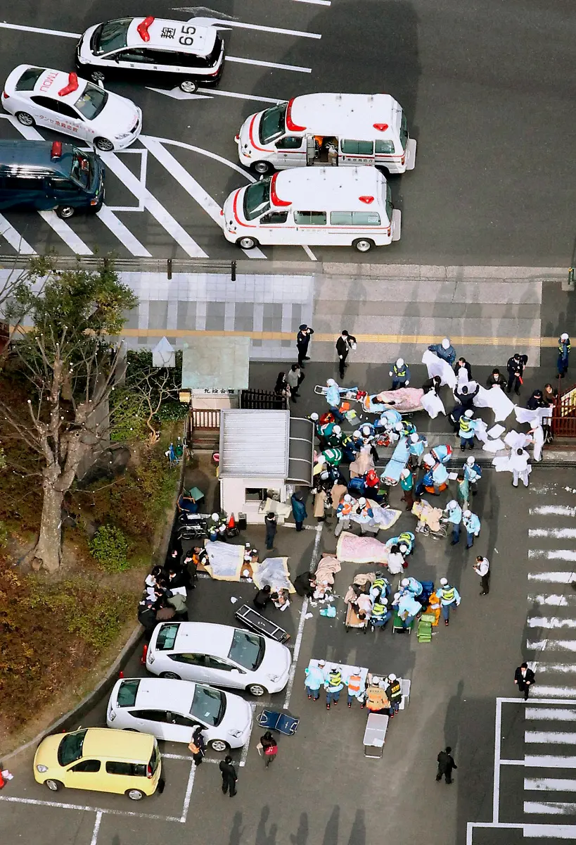 2011-03-11T073934Z-01-SIN01-RTRMDNP-3-JAPAN-QUAKE-JPG2980879123280973785