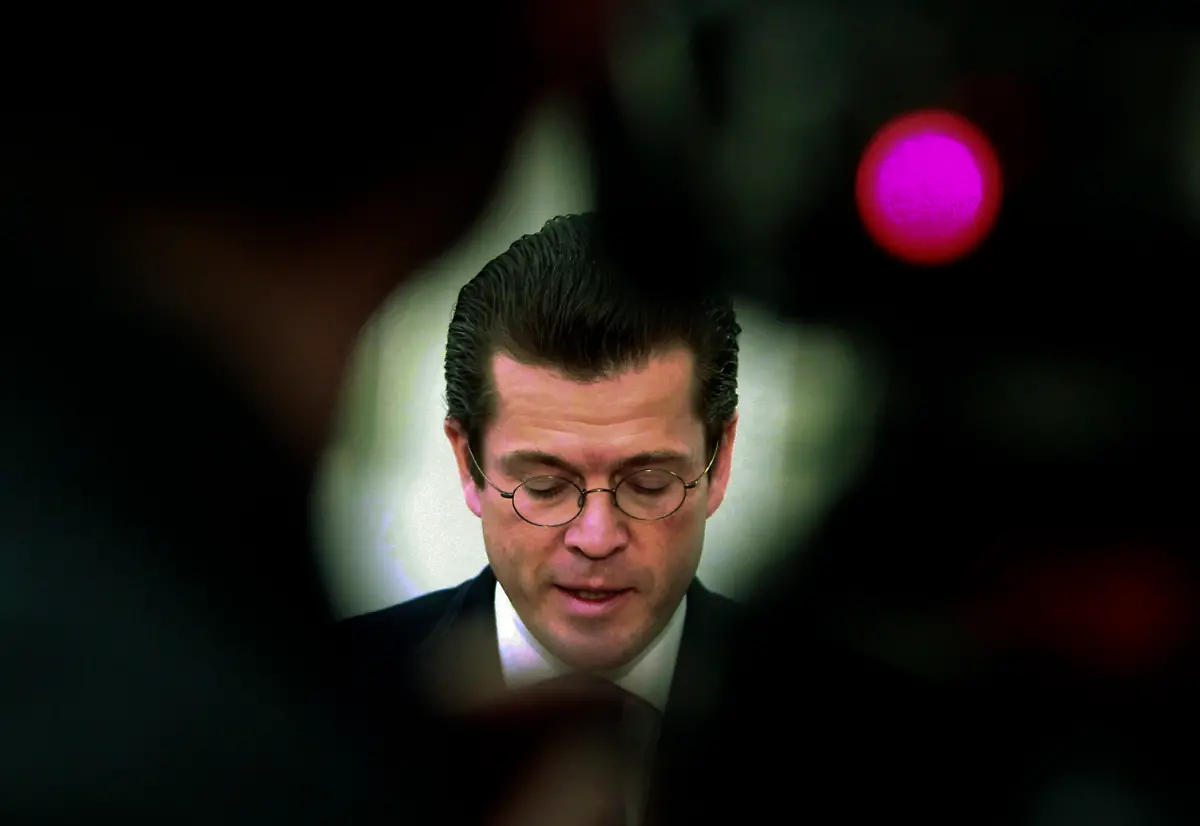 2011-02-18T124739Z-01-TPE01-RTRMDNP-3-GERMANY-MINISTER-PLAGIARISM-JPG7578278708042267526