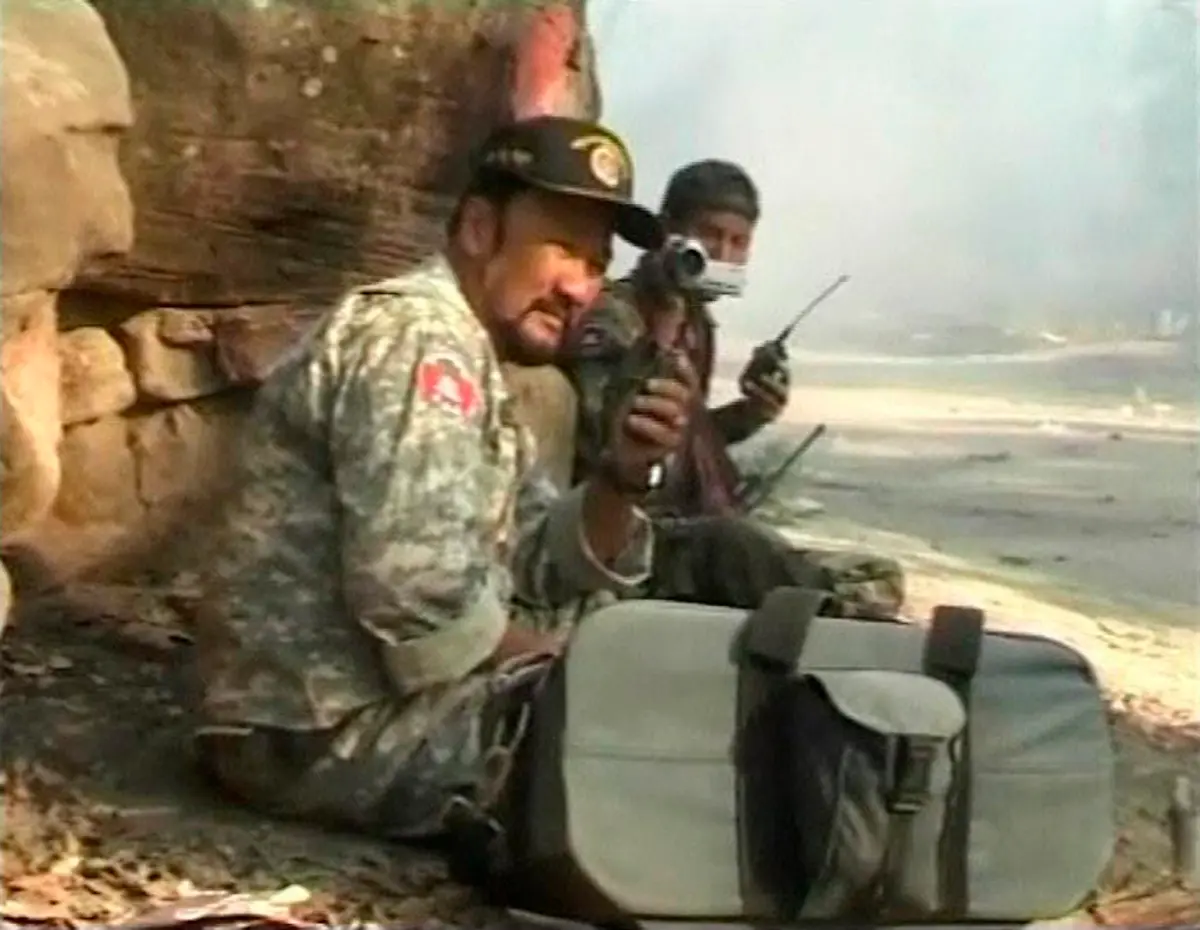 2011-02-05T082414Z-01-SIN101-RTRMDNP-3-THAILAND-CAMBODIA-CLASH-JPG2849616261272607888