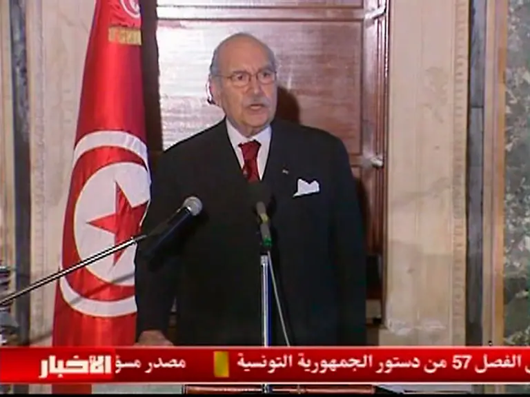 2011-01-16T010419Z-01-SIN601-RTRMDNP-3-TUNISIA-PROTESTS-JPG7068722626099989481