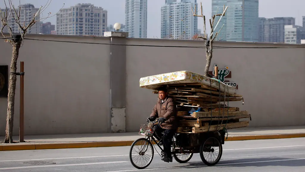 2011-01-10T070812Z-01-CB12-RTRMDNP-3-CHINA-PROPERTY-TAX-JPG5126083832437409904