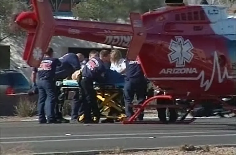 2011-01-08T210737Z-01-WAS03-RTRMDNP-3-USA-SHOOTING-CONGRESSWOMAN-JPG6316021024861517920