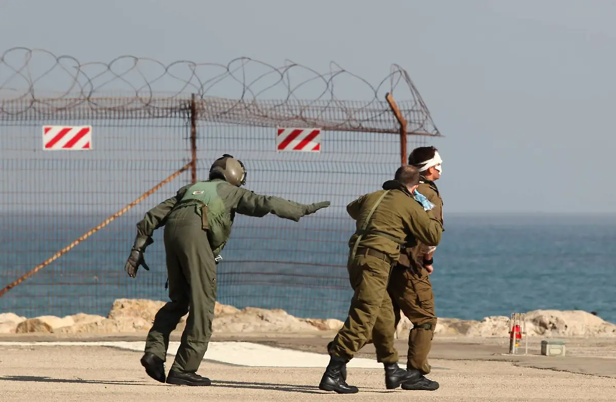 2010-05-31T081626Z-01-JER03-RTRMDNP-3-PALESTINIANS-ISRAEL-FLOTILLA-JPG3274182083279883588