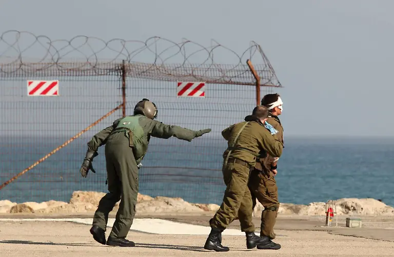 2010-05-31T081626Z-01-JER03-RTRMDNP-3-PALESTINIANS-ISRAEL-FLOTILLA-JPG3274182083279883588