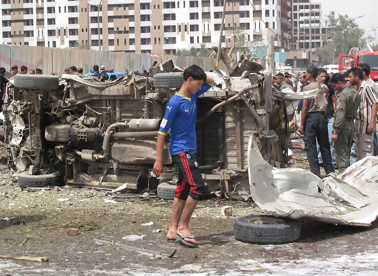 2010-04-04T103919Z-01-BAG405-RTRMDNP-3-IRAQ-VIOLENCE-JPG3786749227086536567