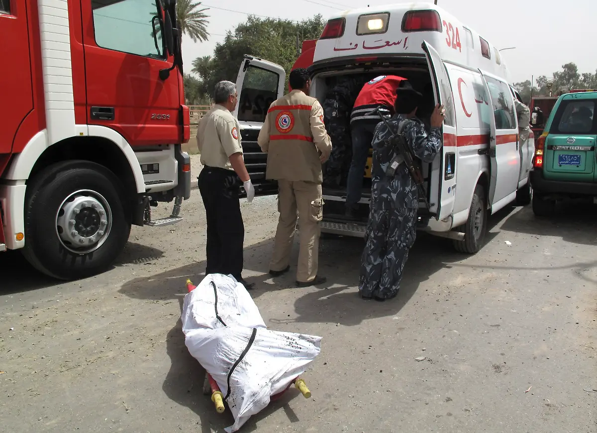 2010-04-04T102114Z-01-BAG406-RTRMDNP-3-IRAQ-VIOLENCE-JPG8364692644377213648