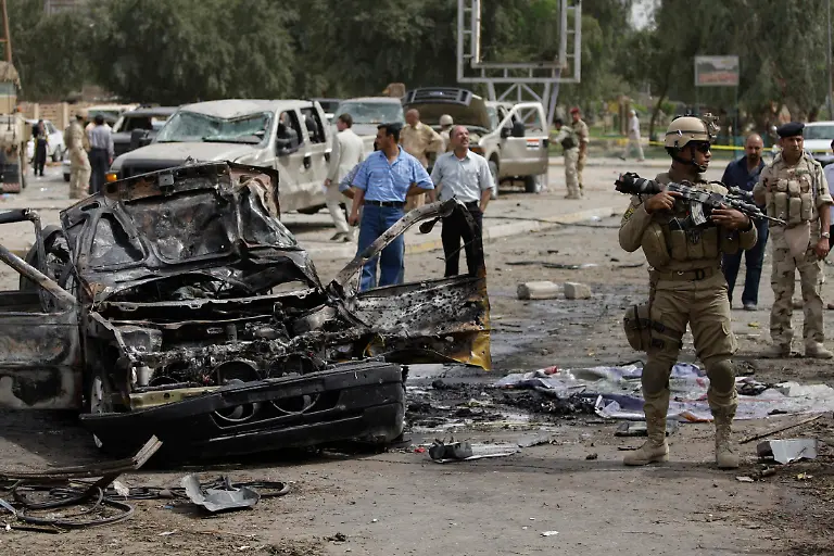 2010-04-04T122756Z-01-BAG203-RTRMDNP-3-IRAQ-VIOLENCE-JPG3889459264775784817