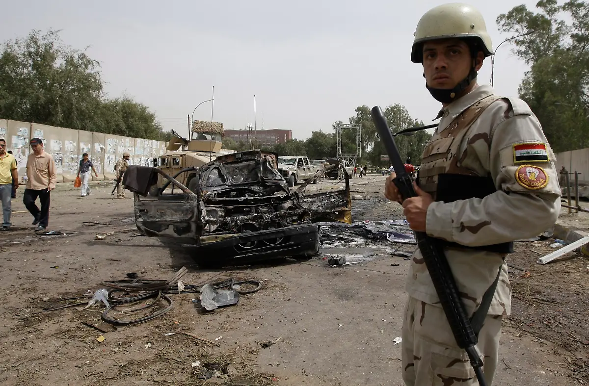 2010-04-04T122801Z-01-BAG202-RTRMDNP-3-IRAQ-VIOLENCE-JPG6567704255103747159