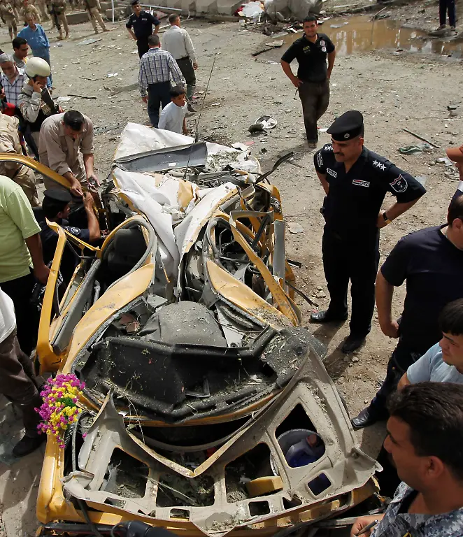 2010-04-04T122852Z-01-BAG408-RTRMDNP-3-IRAQ-VIOLENCE-JPG8079657440671231109