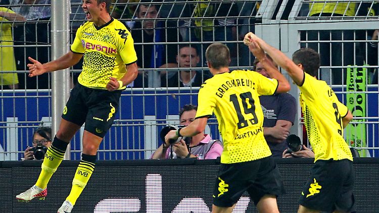 Begehrte Jungstars: Mario Götze und Teamkollege Kevin Großkreutz sollen angeblich auf der Wunschliste des FC Arsenal stehen. Alles Blödsinn, sagt der BVB.