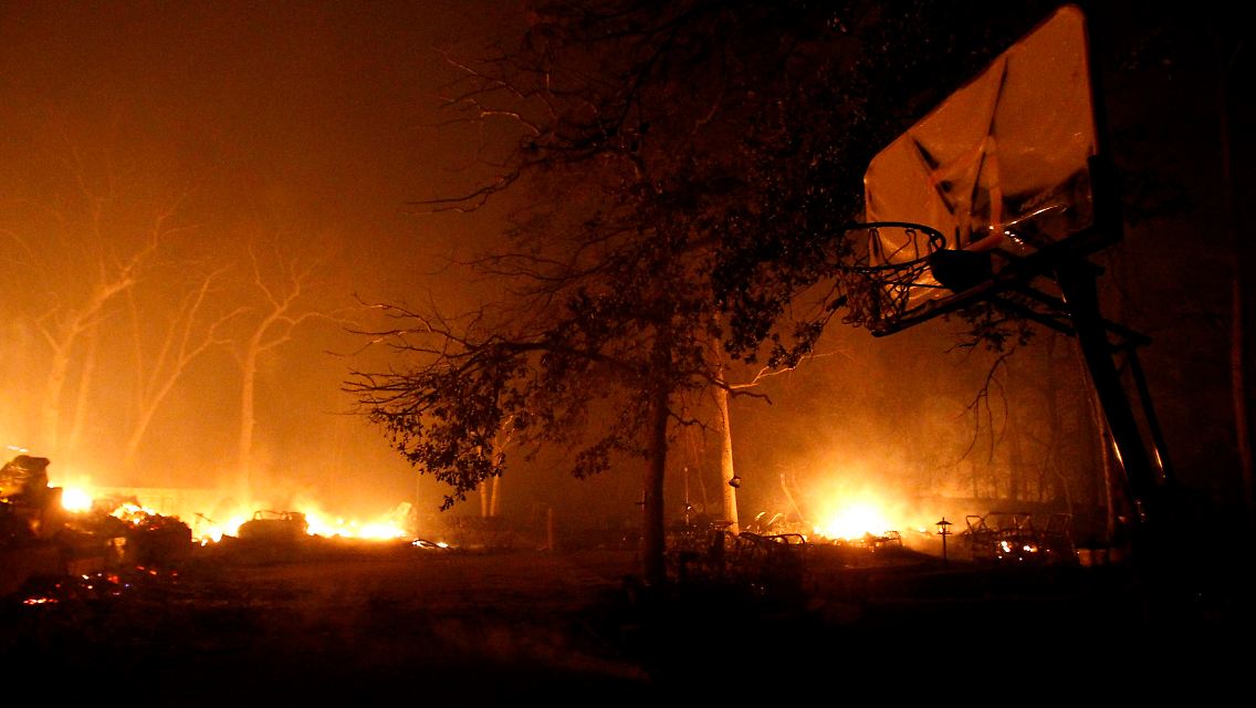 2011-09-06T045515Z_01_DAL33_RTRMDNP_3_TEXAS-WILDFIRES.JPG4619822202031462203.jpg