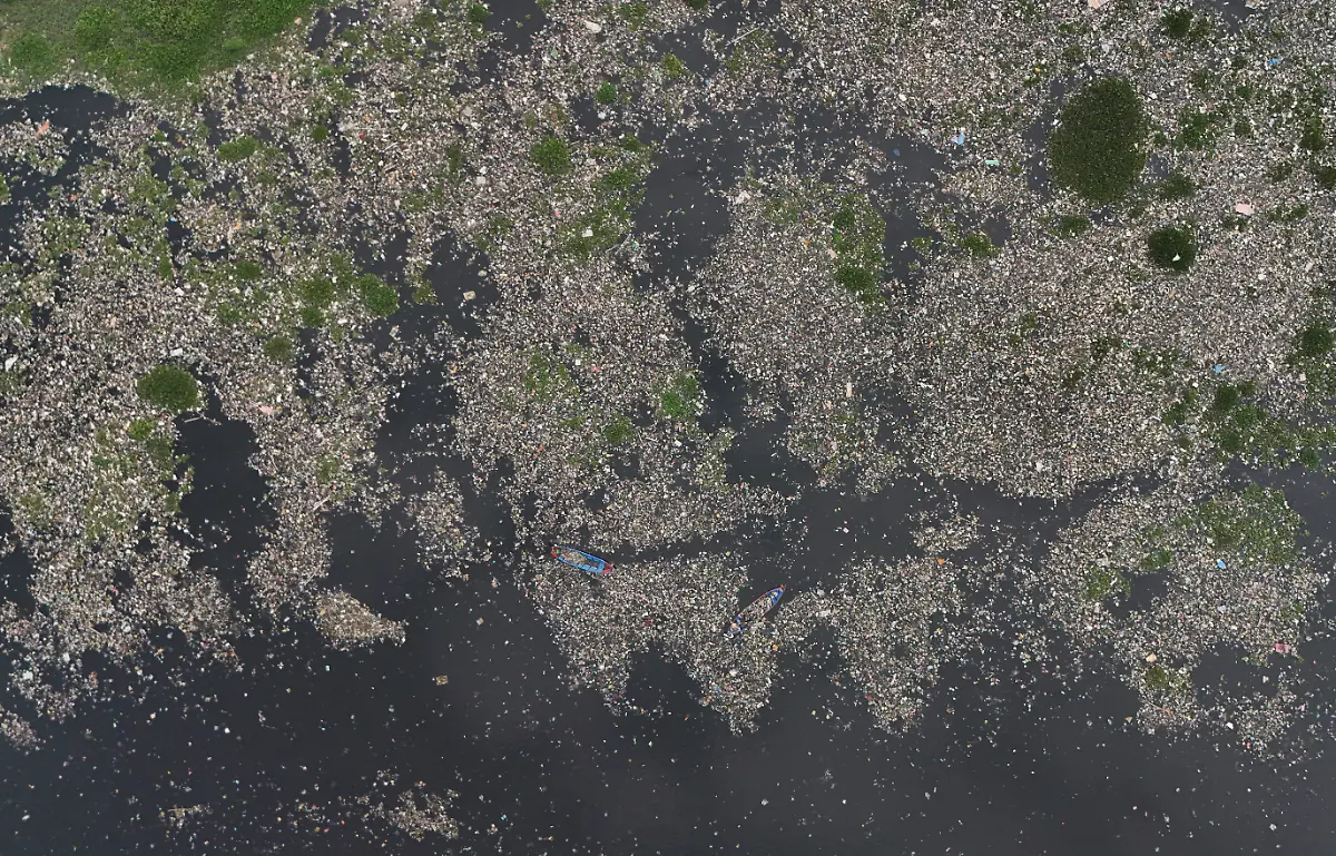 2024-06-13T121451Z-557271635-RC28A8AEI32R-RTRMADP-3-INDONESIA-ENVIRONMENT-RIVER