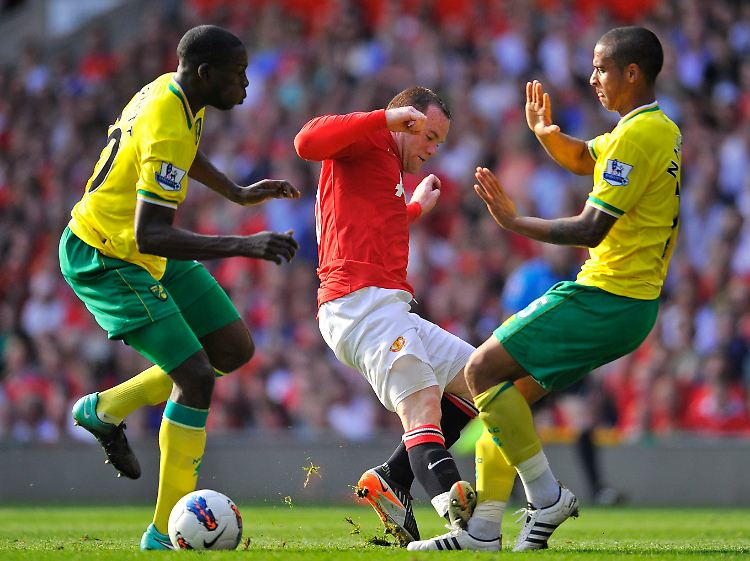 Stadtrivale United mit Wayne Rooney (M) tat sich da wesentlich schwerer gegen Norwich.