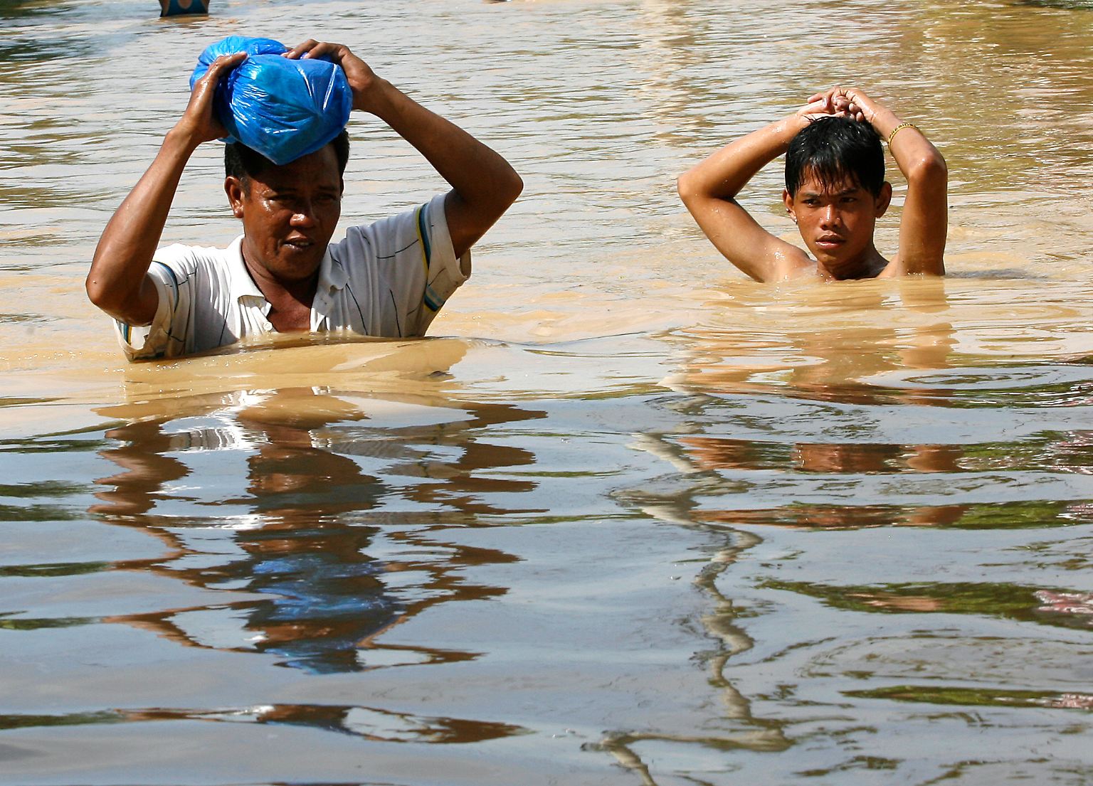 Nach zwei Taifunen innerhalb einer Woche stehen Anfang Oktober 2011 weite Gebiete der Philippinen unter Wasser.