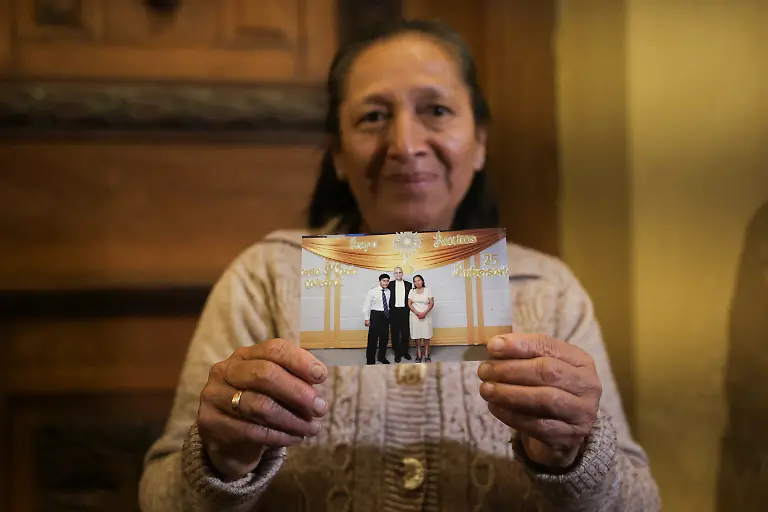 2025-05-09T023135Z-1235864870-RC22EEABZ1ER-RTRMADP-3-POPE-LEO-PERU