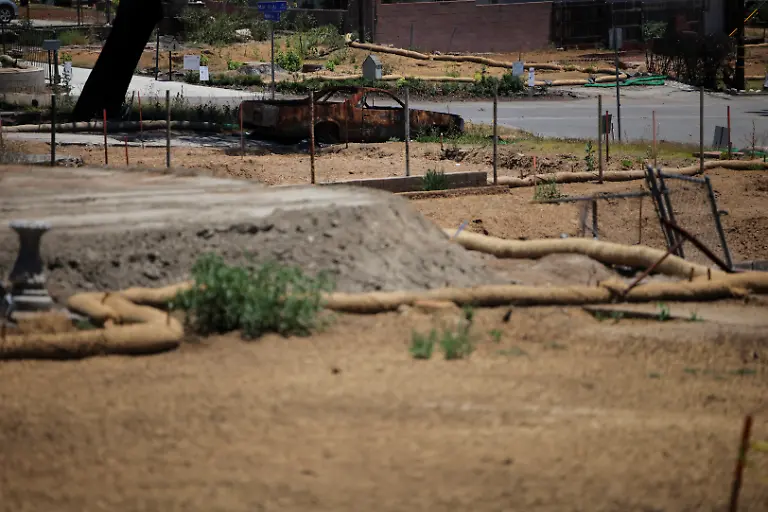 2025-07-03T100557Z-1148669129-RC2LCFAOHHPG-RTRMADP-3-CALIFORNIA-WILDFIRES-ALTADENA