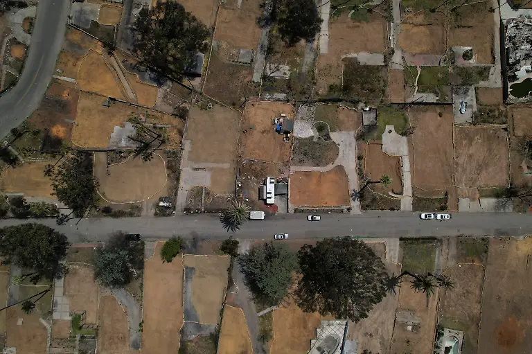 2025-07-03T100608Z-1929160967-RC22XEAFY0ON-RTRMADP-3-CALIFORNIA-WILDFIRES-ALTADENA