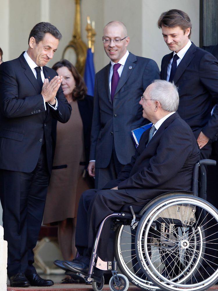 Sonnenschein-Gesichter bei Frankreichs Präsident Sarkozy und Bundesfinanzminister Schäuble.