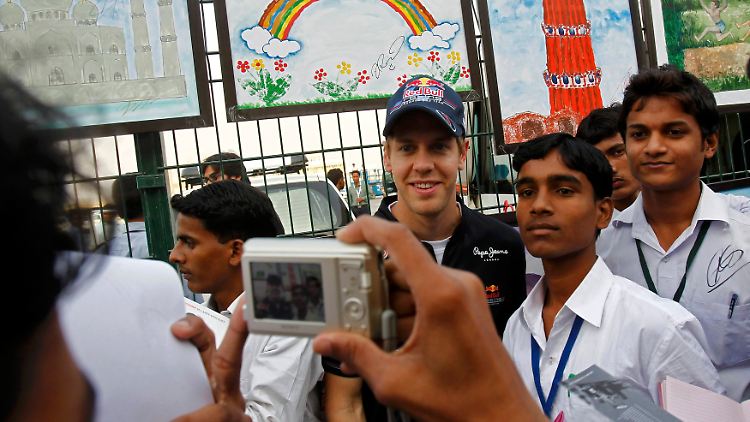 Auch in Indien begehrt: Formel-1-Weltmeister Sebastian Vettel.