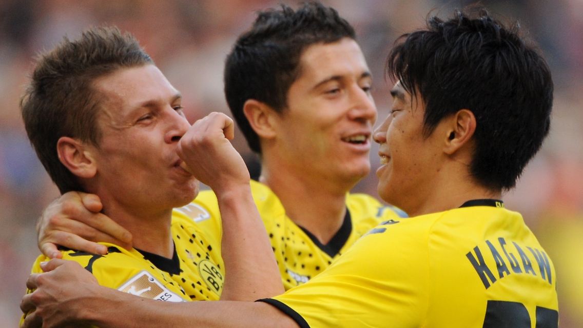 Torfreude: Lukasz Pisczek, links, mit seinen Dortmunder Kollegen Robert Lewandowski und Shinji Kagawa.