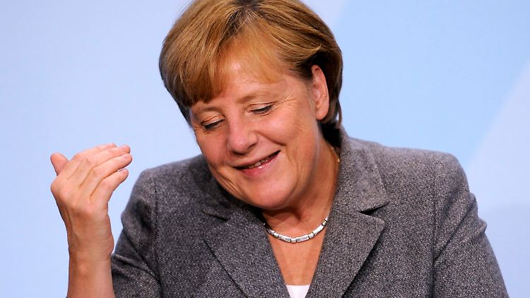Merkel präsentiert die Ergebnisse.