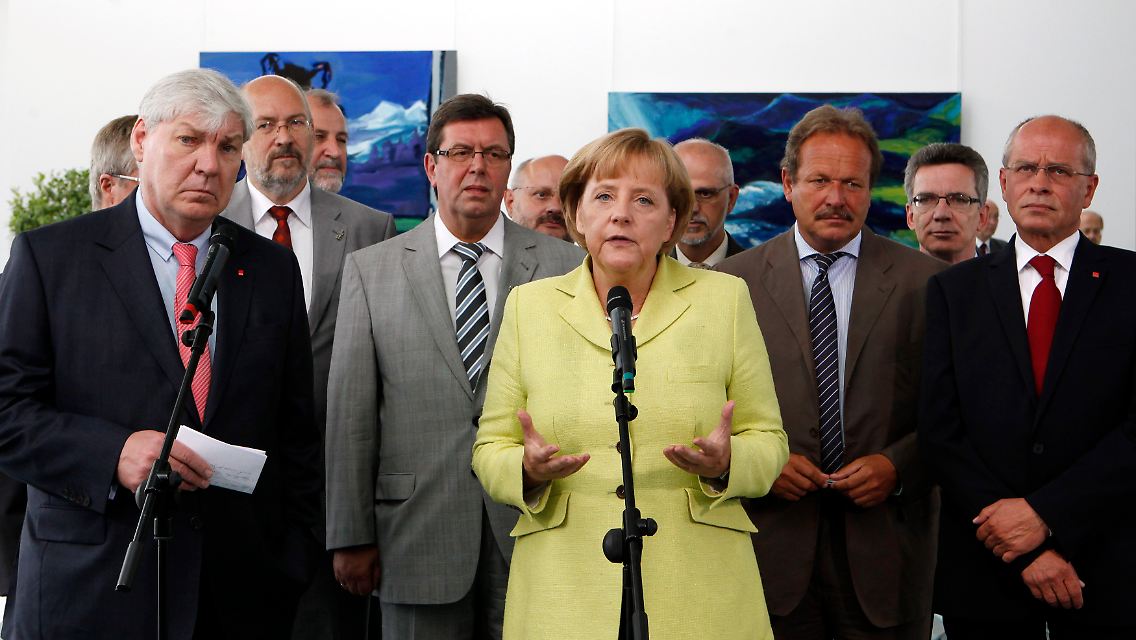 Merkel, Sommer (l) und die Gewerkschafter.