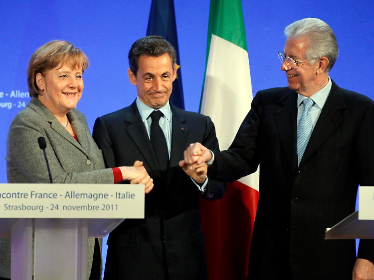 Wollen den Euro retten: Kanzlerin Angela Merkel und ihre Kollegen Nicolas Sarkozy und Mario Monti.