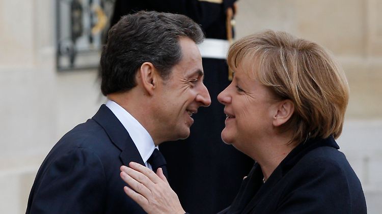 Sie geben in der EU die Richtung vor: Sarkoy und Merkel.