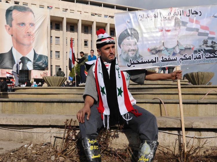 Solche Bilder gibt das Regime in Damaskus frei: ein Unterstützer Assads in der Hauptstadt.
