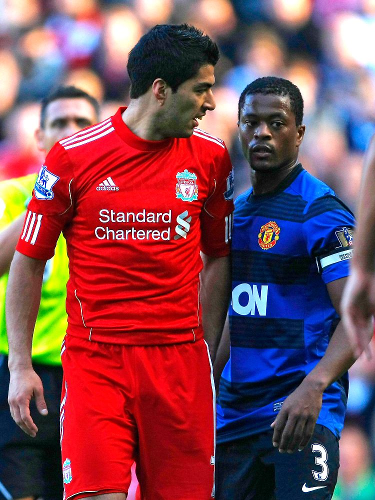 Luis Suarez soll Patrice Evra mehrfach rassistisch beleidigt haben. Seine Sperre ist noch nicht rechtskräftig.