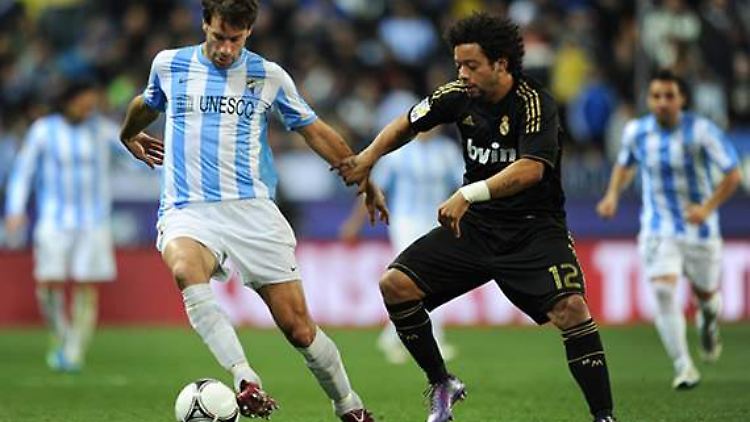 Ex HSV-Star Ruud van Nistelrooy im Zweikampf mit Reals Marcelo.