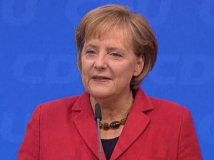 Kanzlerin Merkel will die zerstrittenen Milchbauern zusammenbringen.