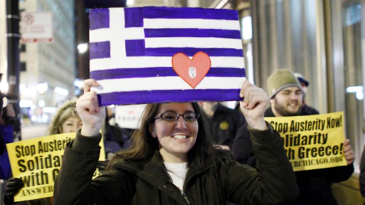 Teil einer weltweiten Debatte: Solidarität mit Griechenland fordern diese Occupy-Demonstranten in Chicago.