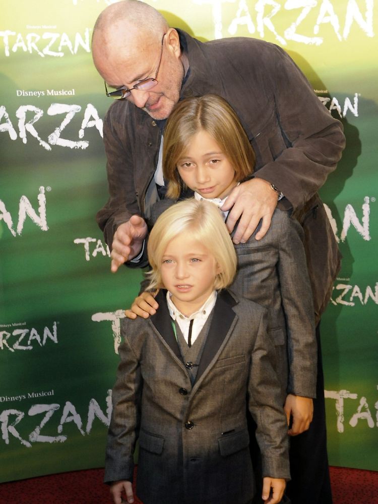 Collins mit seinen Söhnen Nicholas und Matthew (vorn) im Oktober 2009 in Hamburg.