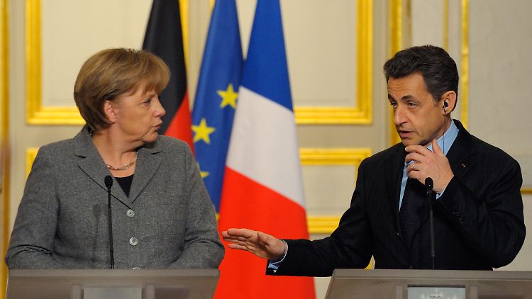 Madame Merkel und Monsieur le Président: Der deutsch-französische Motor will sparen.