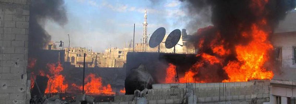 Teile von Homs stehen in Flammen.