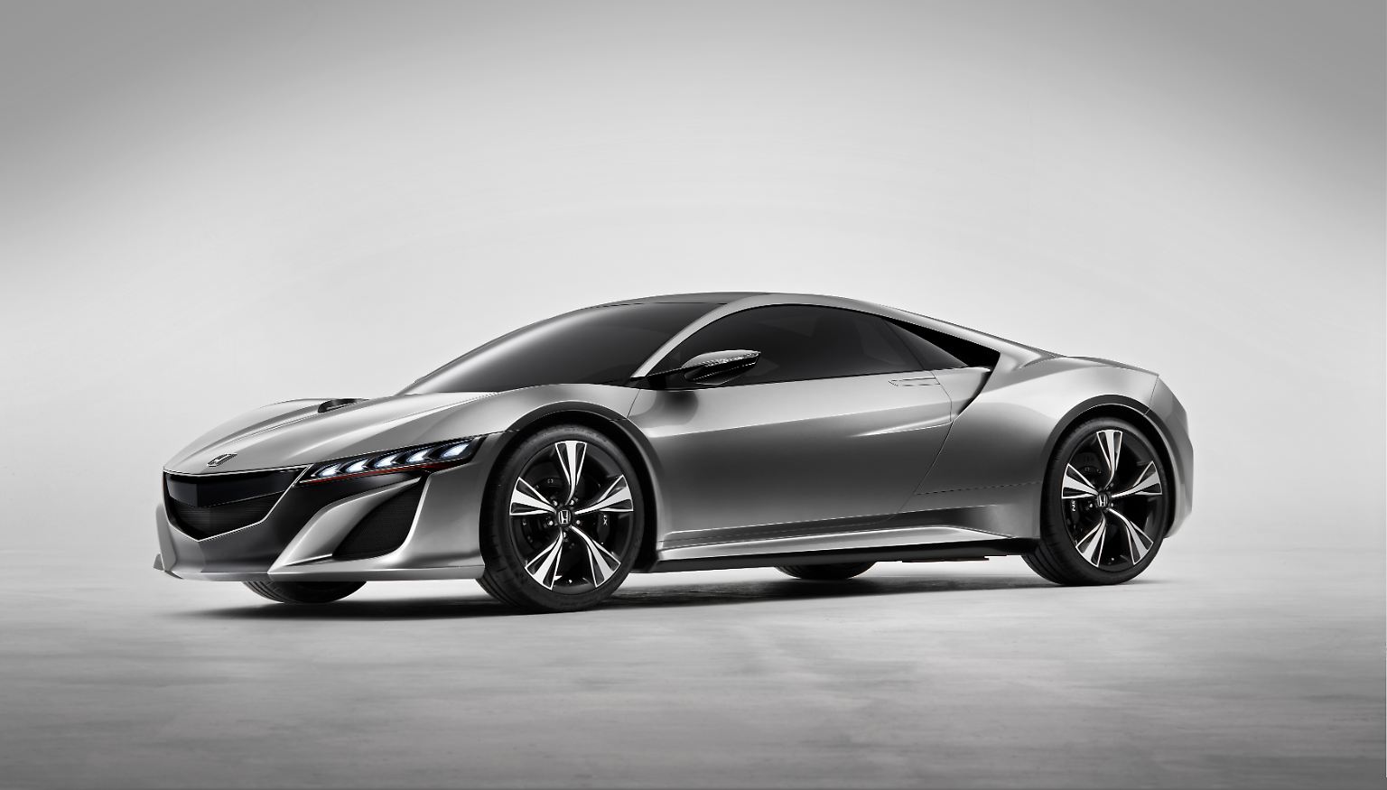 Honda wartet auf dem Genfer Autosalon mit einer Studie seines neuen Supersportlers NSX auf. Das Concept Car ... 