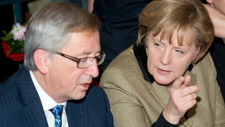 Angela Merkel, mit Euro-Gruppenchef Jean-Claude Juncker.