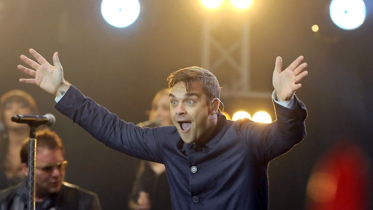 Robbie Williams geht wieder auf der Bühne auf.