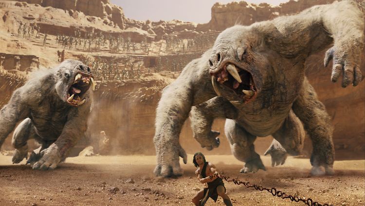 Auch King Kong lässt grüßen: John Carter alias Taylor Kitsch in der Arena.