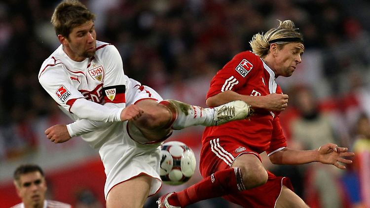 Angestrengt haben sie sich ja: Stuttgarts Thomas Hitzlsperger und der Münchner Anatoli Timoschtschuk.