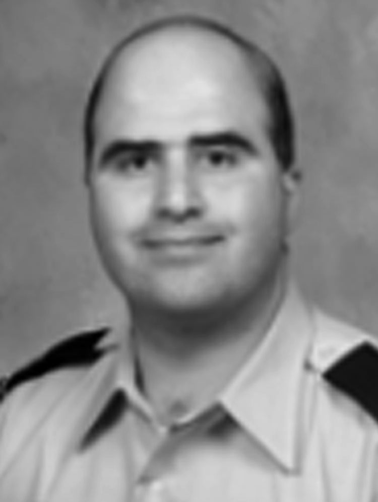 Was hat ihn dazu veranlasst? Hasan auf einem Foto in seiner Uniform.