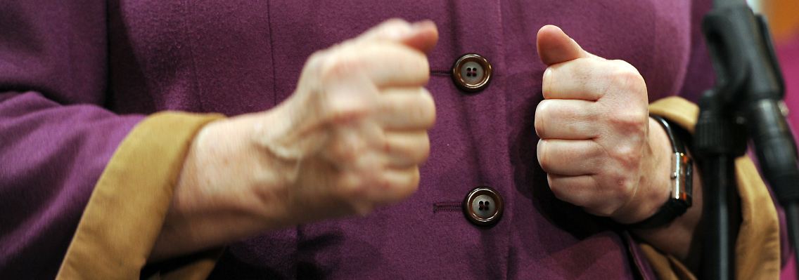 Merkel-Fäuste: Die Art der Kanzlerin gefällt den Wählern offenbar.